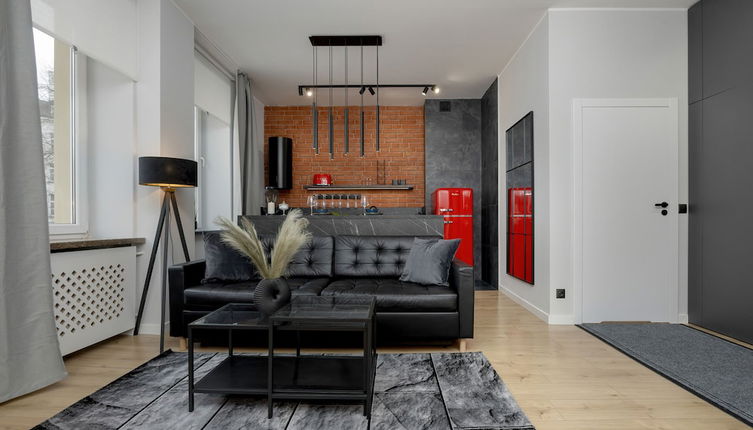 Photo 1 - Grey and Red Apartment by Renters