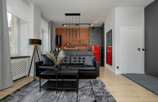 Photo 1 - Grey and Red Apartment by Renters