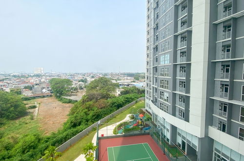 Photo 19 - Homey And Warm 1Br At Ciputra International Apartment