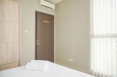 Photo 3 - Homey And Warm 1Br At Ciputra International Apartment