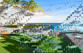 Foto 3 - Elegant Beachfront Condo: Your Perfect Getaway!
