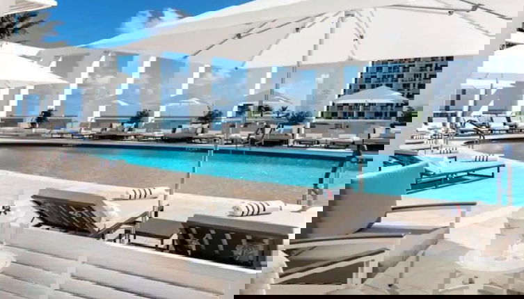 Foto 1 - Elegant Beachfront Condo: Your Perfect Getaway!