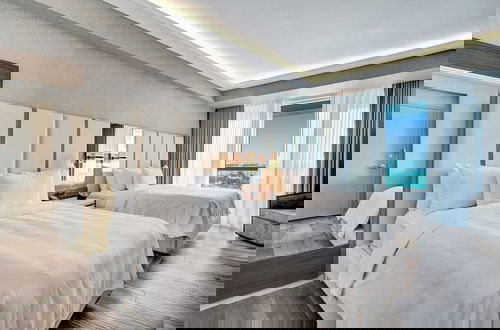 Foto 6 - Elegant Beachfront Condo: Your Perfect Getaway!