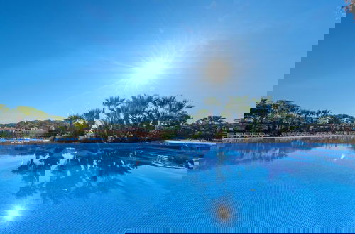 Foto 8 - Beautiful Wooden Bungalow With Shared Pool
