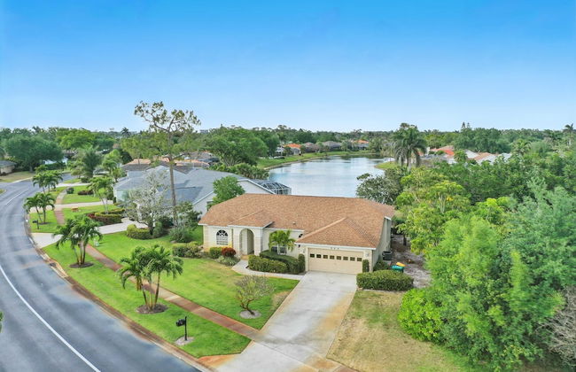 Private Pool, Pond Views, & Bonus Lounge in Gated Naples Community Drive to Dining & Sand - Photo 1