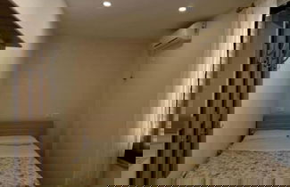 Foto 3 - Tirent Apartment - Cozy Bedrooms Stay by Golem Beach.