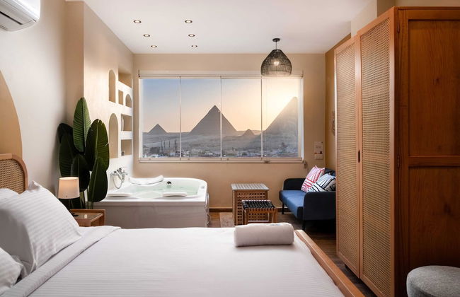 Xuru Stays I Jacuzzi Studios @ The Pyramids - Foto 12
