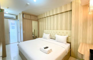 Foto 1 - Cozy And Comfy Studio At Bassura City Apartment