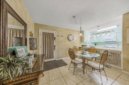 Photo 11 - Cozy Condo on the White Sand Beach With Pool