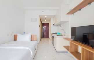 Photo 3 - Nice And Comfy Studio Apartment At Sky House Bsd