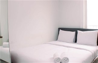 Photo 1 - Warm And Simply Studio Room At Azalea Suites Apartment