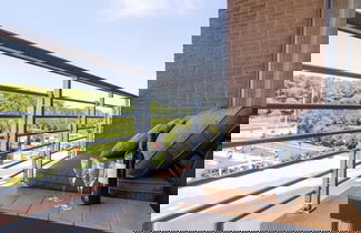 Foto 2 - Bright Apartment With Parking Near the Beach