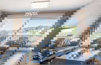 Foto 1 - Bright Apartment With Parking Near the Beach