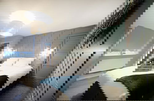 Foto 6 - The Stamford Apartment