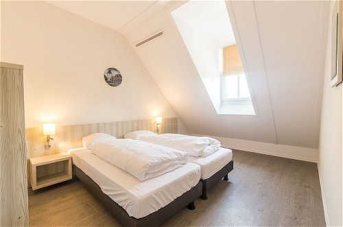Foto 8 - Comfy Apartment With Sauna