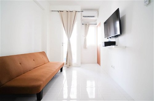 Photo 13 - Cozy Living And Tidy 2Br At Puncak Dharmahusada Apartment