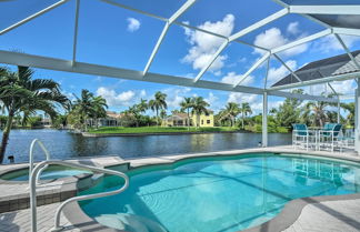 Photo 1 - Canalfront Cape Coral Retreat w/ Pool & Hot Tub