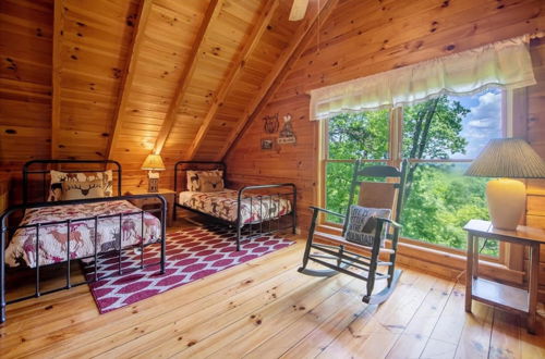 Photo 9 - Hilltop Hideaway - Endearing Mountain Cabin With Hot tub Foosball pet Friendly