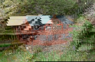 Foto 1 - Barefoot Cabin 4 Bedroom Cabin by RedAwning