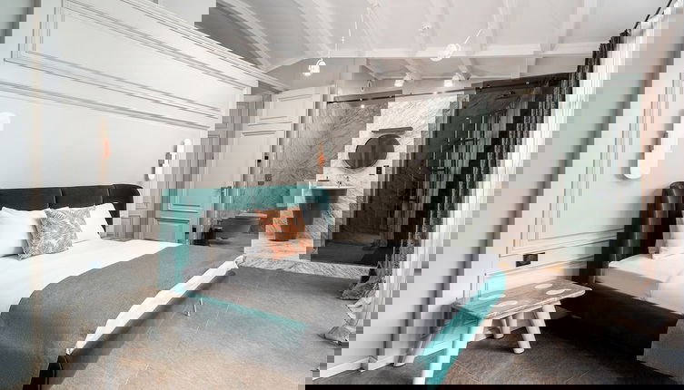 Photo 1 - RA Apartments