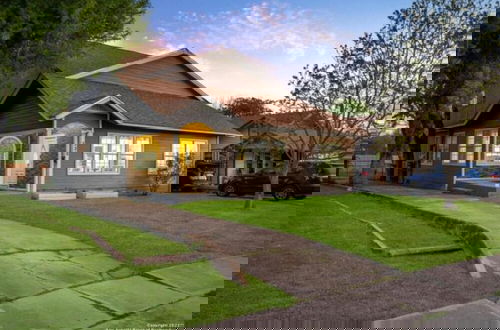 Photo 2 - Experience Serenity in a 4BR 3BA Downtown Home