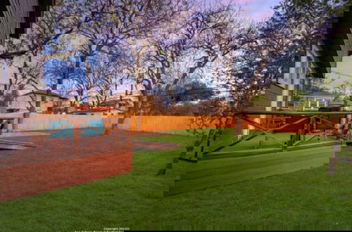 Photo 3 - Experience Serenity in a 4BR 3BA Downtown Home