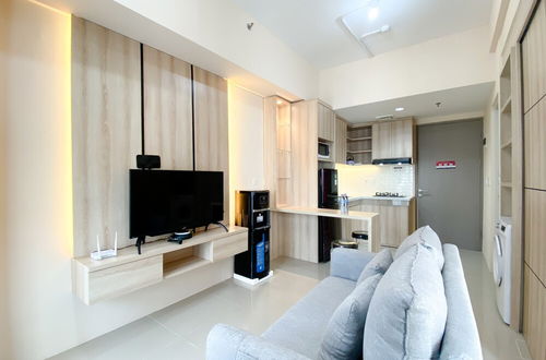 Photo 15 - Spacious And Homey 1Br Vasanta Innopark Apartment