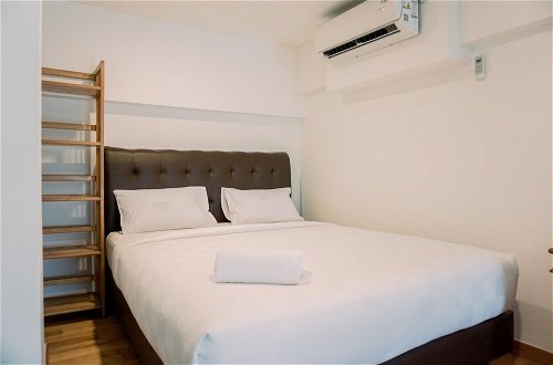 Foto 5 - Cozy Stay And Comfy Studio Loft Kingland Avenue Apartment