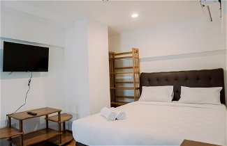 Foto 2 - Cozy Stay And Comfy Studio Loft Kingland Avenue Apartment