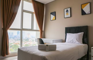 Photo 2 - Spacious And Comfy 3Br Ciputra International Apartment