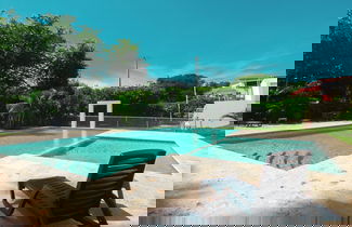 Foto 1 - 2JA Management Group - White Hill Condos