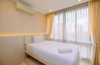 Photo 2 - Comfort Stay 2Br At Masterpiece Apartment