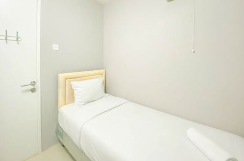 Photo 6 - Best Strategic 2Br Apartment At Bassura City