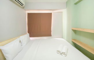 Photo 3 - Best Strategic 2Br Apartment At Bassura City