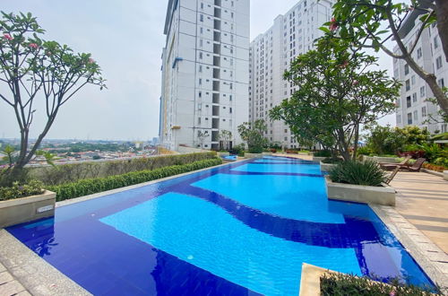 Photo 20 - Best Strategic 2Br Apartment At Bassura City