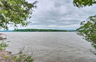 Photo 3 - Lakefront Ozark Cottage: Deck w/ Covered Dock