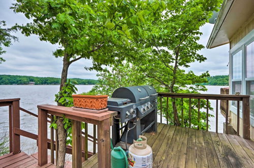 Photo 17 - Lakefront Ozark Cottage: Deck w/ Covered Dock