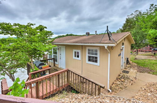 Photo 12 - Lakefront Ozark Cottage: Deck w/ Covered Dock