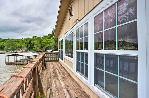 Photo 5 - Lakefront Ozark Cottage: Deck w/ Covered Dock