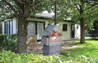 Photo 1 - Quaint Chalet in Uden With Terrace