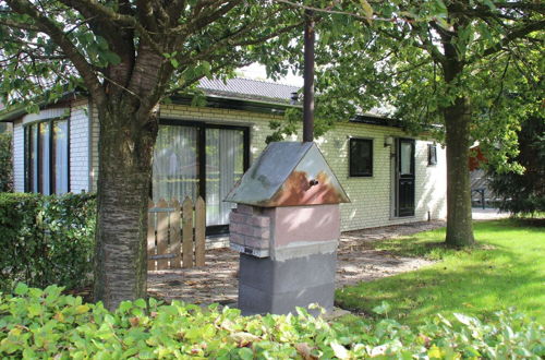 Photo 1 - Quaint Chalet in Uden With Terrace