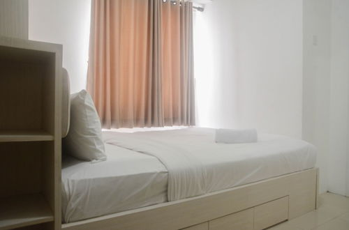 Photo 6 - Comfort Living 2Br Room At Bassura City Apartment