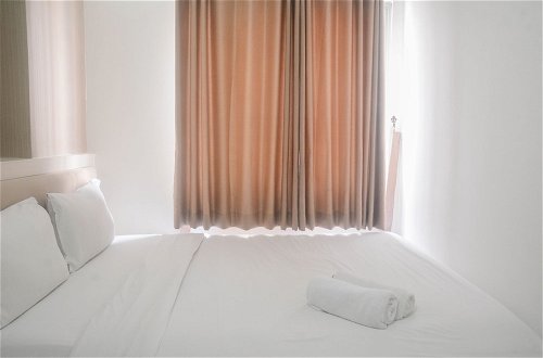 Photo 3 - Comfort Living 2Br Room At Bassura City Apartment