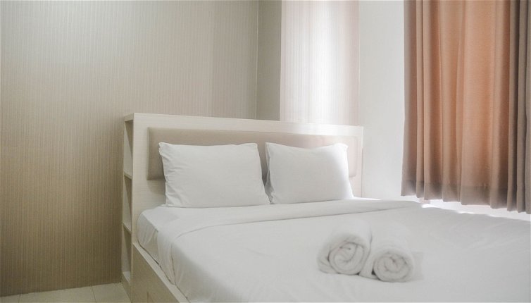 Photo 1 - Comfort Living 2Br Room At Bassura City Apartment