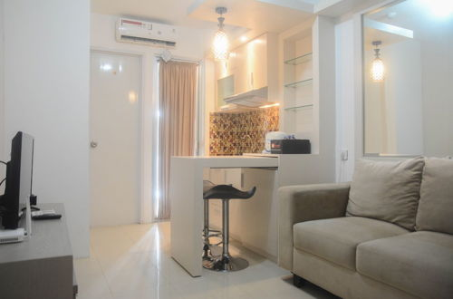Photo 10 - Comfort Living 2Br Room At Bassura City Apartment