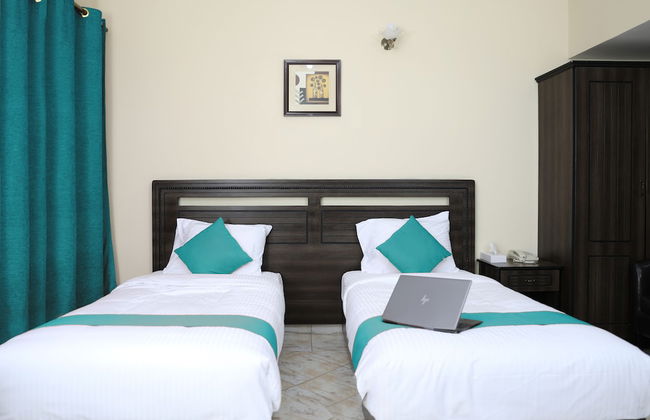 RUWI BEACH HOTEL APARTMENTS - Photo 13