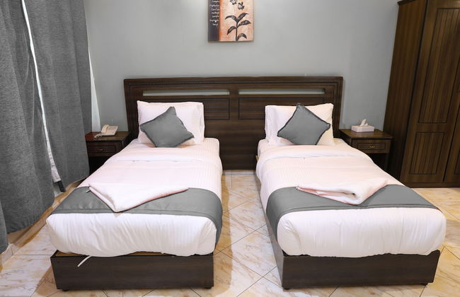 RUWI BEACH HOTEL APARTMENTS - Photo 11