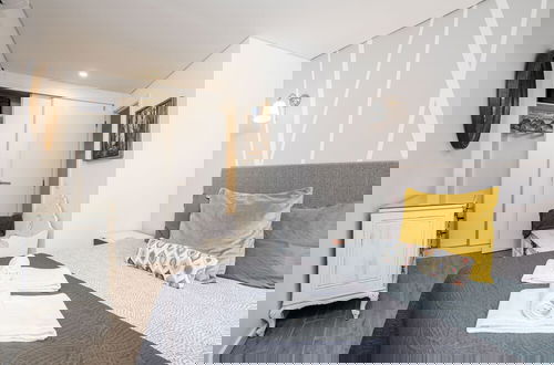 Foto 8 - Designer Flats