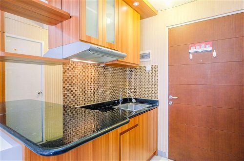 Photo 6 - Cozy Living Studio Room Taman Melati Margonda Apartment