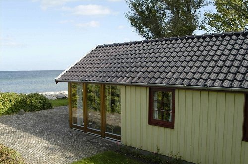 Foto 16 - Magical Holiday Home with Barbecue in Otterup near Sea